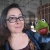 Headshot of Carol Silverman with a Kermit puppet.
